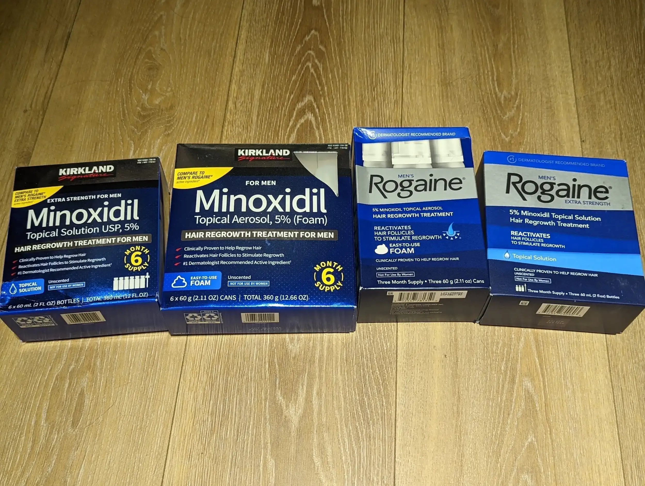 Rogaine and Kirkland minoxidil bottles side-by-side comparison